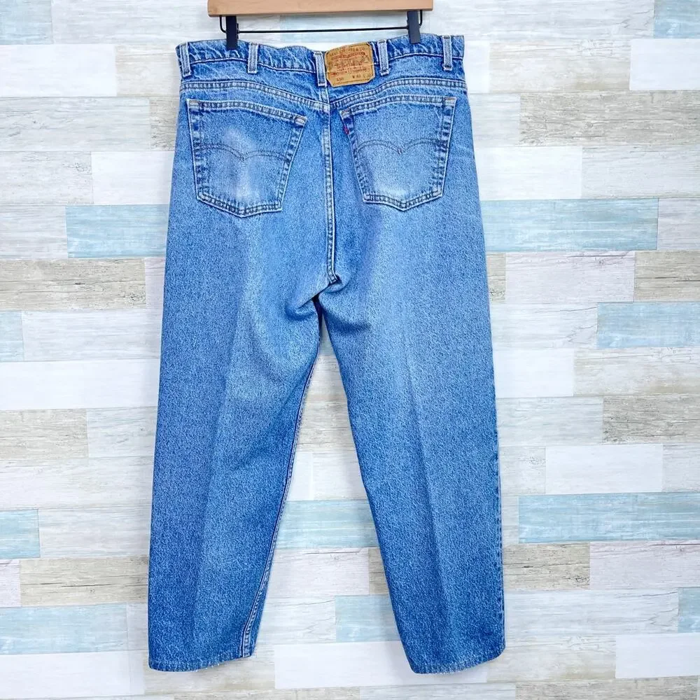 Levis Vintage 550 Rigid Jeans Blue Light Wash Distressed Made in USA Mens 40X28